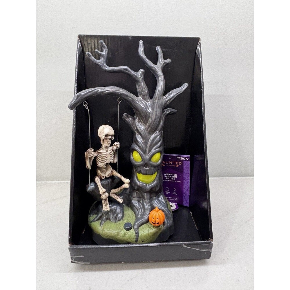 HAUNTED LIVING ANIMATED SKELETON IN TREE NEW